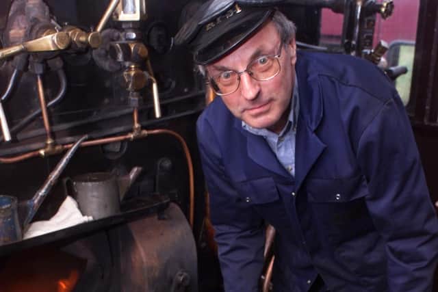 Irwin Pryce who was part of the restoration team stokes the furnace of the newly overhauled steam railway Locomotive No 4 in July 2002. Picture: Andy McConnell/News Letter archives