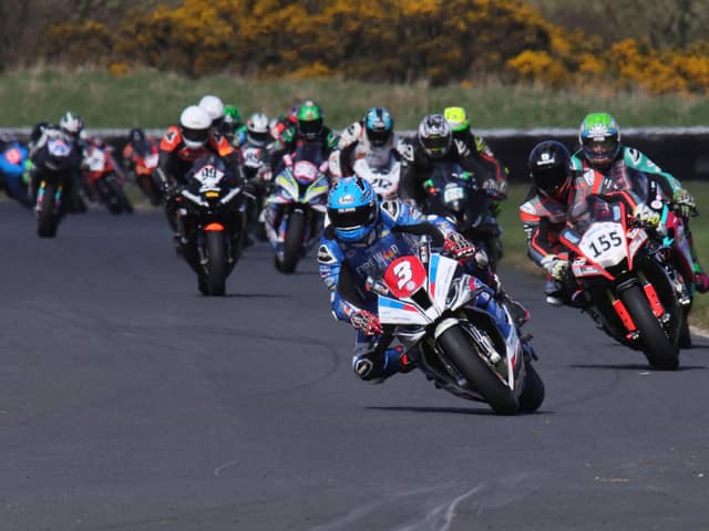 Ryan Gibson (Gibson Motors BMW) leads Jonny Campbell (Magic Bullet Yamaha) on the opening lap of the Enkalon Superbike race at Bishopscourt. Picture: Rod Neill/Pacemaker Press
