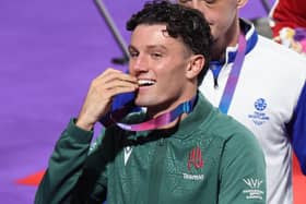 Jon McConnell of Northern Ireland celebrates after being awarded a gold medal in the medal ceremony for the Men's 70kg final at the SEC Centre during day nine of the 2026 Commonwealth Games in Glasgow