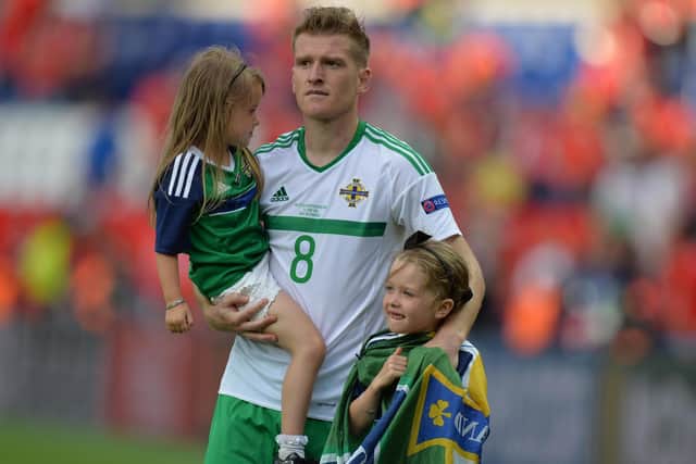 Northern Ireland captain Steven Davis with his daughters after the Euro 2016 clash against Wales at Parc De Princes in Paris