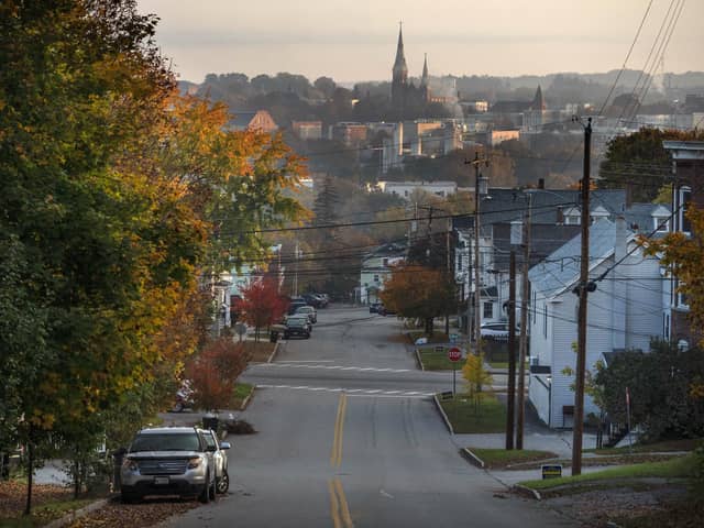 The streets are quiet on Friday in this view looking towards Lewiston, Maine, as a lockdown remains in effect after this week's mass shootings. Police are still searching for the suspect. Lewiston is near both to Bangor Maine and Belfast Maine. That there are two cities of that name is a reminder of the Scots Irish influence (AP Photo/Robert F. Bukaty)