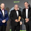 Former CEO of the NI Dairy Council, Dr Mike Johnston MBE was the recipient of the 'Lifetime Achievement' award at this week's Farming Life awards in association with Cranswick Country Foods. He is pictured with compere Barra Best and Martin Walsh, site financial controller, Cranswick. Pic: McAuley Multimedia