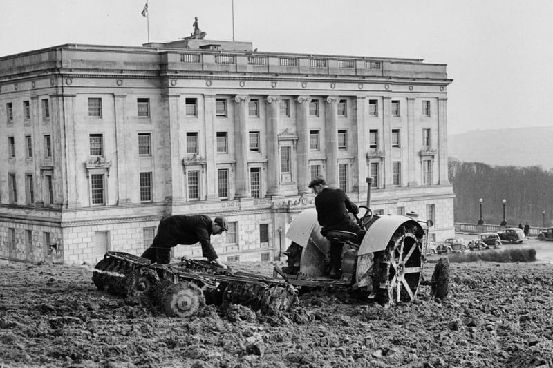 A tractor ploughing land beside Parliament Building (official residence of the Speaker of the House of Commons in Northern Ireland) on the Stormont Estate. The Northern Ireland Government is having the land ploughed as part of the 'Grow More Food' campaign.    (Photo by M McNeill/Getty Images)