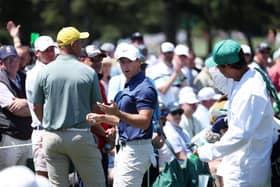 Rory McIlroy reacts after missing a putt on the second green during the final round of the Masters