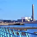 Kilroot Power Station near Carrickfergus will continue to burn fossil fuels after switching electricity generation from coal to gas