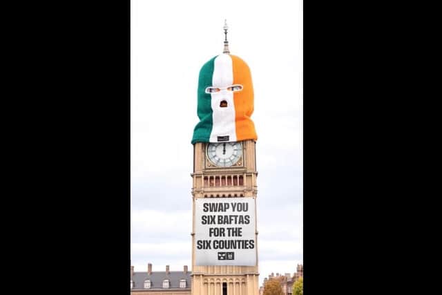 A still from a video Kneecap mocked up ahead of the Bafta ceremony, showing part of the Houses of Parliament covered by their trademark tricolour balaclava. The band lost five of the six awards they were nominated for.