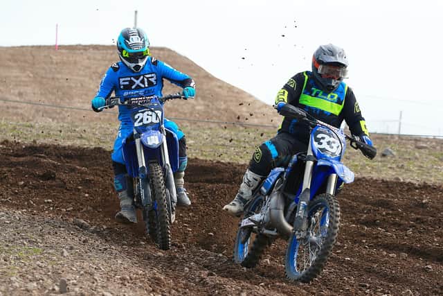 Jordan McMullan and overall Clubman MX2 winner Stephen Maitland in action