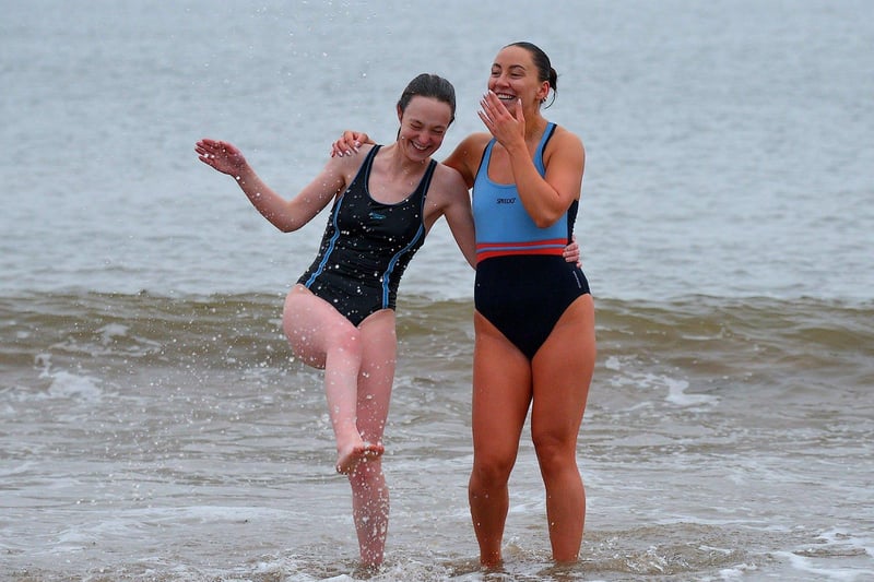 Eppie Heaney and Ciara Armstrong took part in the annual Christmas morning charity swim at Ludden beech