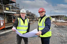 Ballyclare-headquartered Hagan Homes has begun phase three of its Enler Village development in Comber, Co. Down representing a £9.5m investment from the homebuilder.
Pictured are Trevor Kennedy, director of construction, Hagan Homes and Albert Lennon, site manager, DB Building Contracts