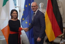 Foreign Affairs Minister Simon Coveney, welcomes the Minister for Foreign Affairs of Germany, Annalena Baerbock, to Iveagh House in Dublin, for her two day visit to Ireland. Picture date: Thursday December 8, 2022.