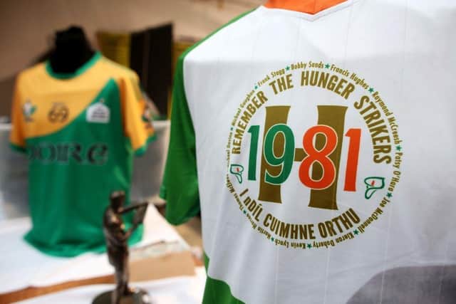 IRA Hunger strike t-shirts are seen displayed for sale at Sinn Fein's Ard Fheis (annual conference), 2019. (Photo by Paul Faith / AFP) (Photo by PAUL FAITH/AFP via Getty Images)