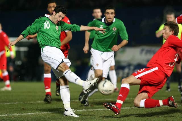 Ivan Sproule in action for Northern Ireland against Wales in February 2007