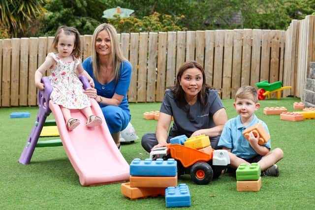Celebrating Clear Day Nurseries’ prestigious UK industry gongs for its childcare facilities are Sienna McLoughlin (2) and mum Nicole, Evelyn Verschuur, pre-school room leader and Daire O’Connor (4), at Kids@BT9 Daycare in Belfast. Clear Day Nurseries operates in Belfast, Dundonald, Portadown, Glengormley, Lurgan, Lisburn and Bangor employing over 270 staff and catering for around 800 local children