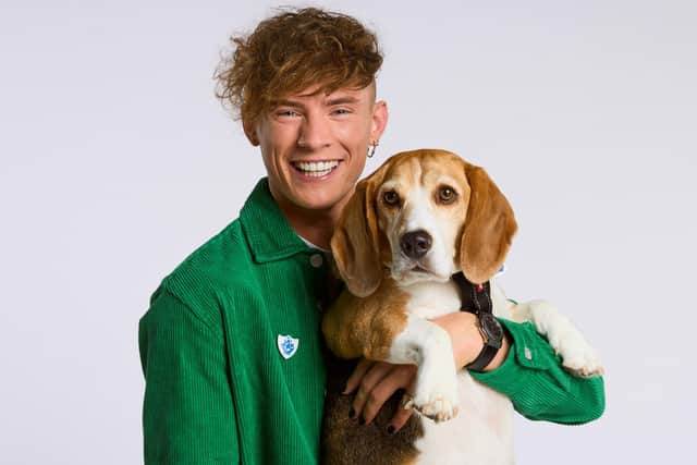 New Blue Peter presenter Joel Mawhinney with Henry the dog