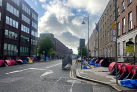 Authorities in Dublin have today been moving asylum seekers who have been sleeping in tents on Mount Street, beside the city's International Protection Office