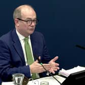 Northern Ireland's Chief Medical Officer Professor Sir Michael McBride , giving evidence to the inquiry assessing Northern Ireland's handling of the Covid emergency at the Clayton Hotel in Belfast