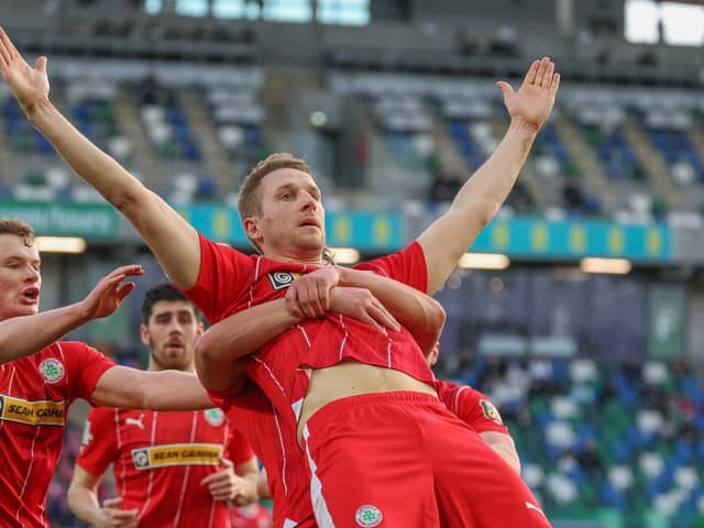 Jonny Addis celebrates after scoring Cliftonville's first goal in their 2-0 win over Larne. PIC: Desmond Loughery/Pacemaker Press