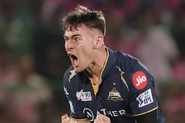 Josh Little celebrates picking up a wicket in the IPL
