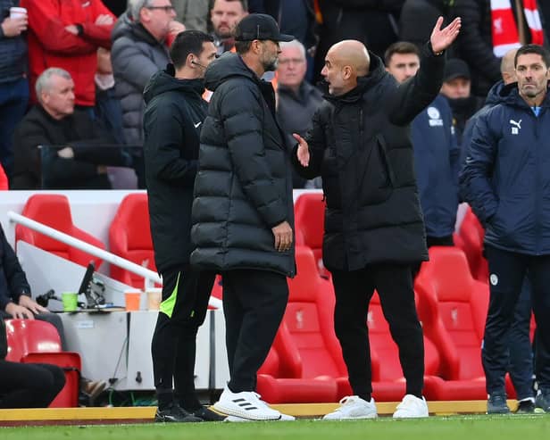 Liverpool manager Jurgen Klopp and his Manchester City counterpart Pep Guardiola will face each other in Sunday's big Premier League clash at Anfield