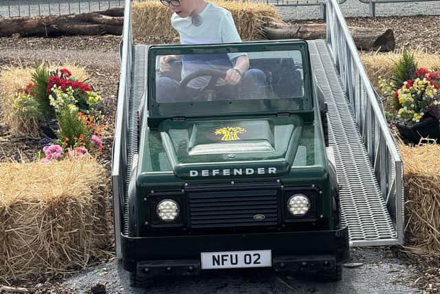 Harry Copeland from Poyntzpass enjoying the Mini Land Rover experience at the Balmoral Show