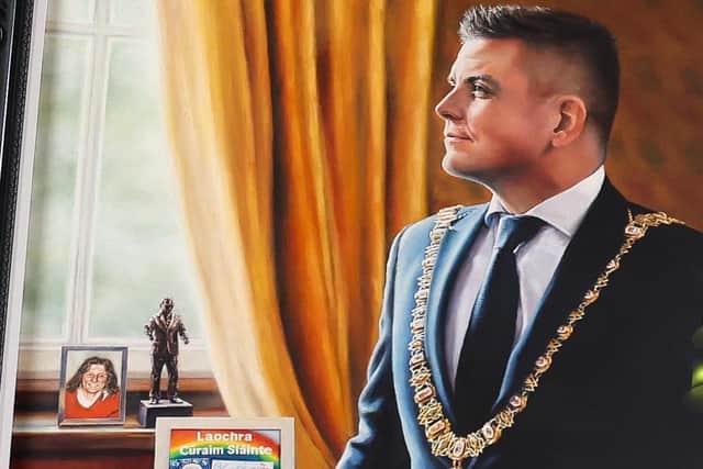 The portrait of former Lord Mayor of Belfast Danny Baker, which also features a photo of IRA hunger striker Bobby Sands, in the bottom left of the image.
