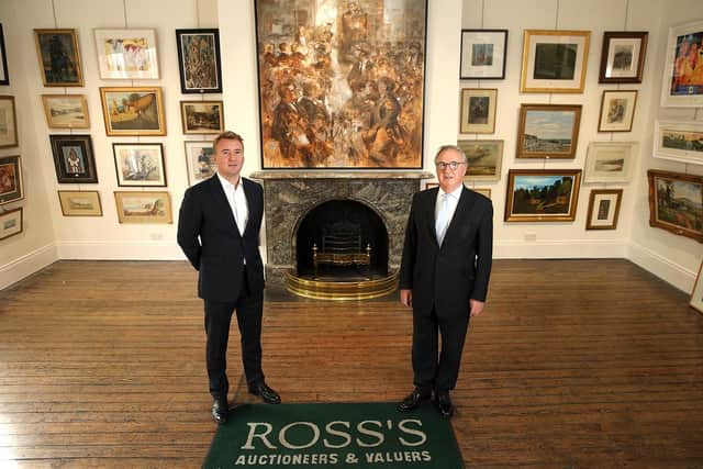 Angus and Daniel Clarke in the historic Ross’s Auction Rooms in Belfast’s City Centre. The business, which is marking its centenary, has invested £750,000 to digitise its operations and extend its reach to a global audience with its art, antique and jewellery auction platforms available online