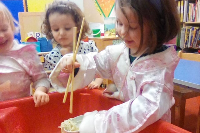 Little ones playing together at First Steps nursery in Buxton