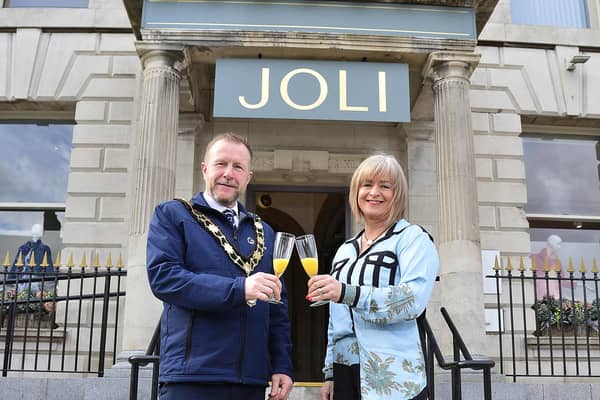 The Mayor of Antrim and Newtownabbey, alderman Stephen Ross, and Joli Clothing owner, Lorraine McConnell, raised a toast to celebrate the reopening of the boutique at the former Ulster Bank building on Ballyclare's Main Street