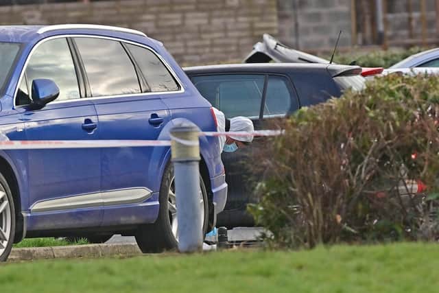Pacemaker Press 23/02/23: Police and Forensics at the scene as an  attempted murder investigation has been launched after an off-duty police officer was shot at a sports complex in Omagh, County Tyrone, on Wednesday.