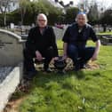 Nigel Henderson (left) and Peter McCabe at the Russell grave