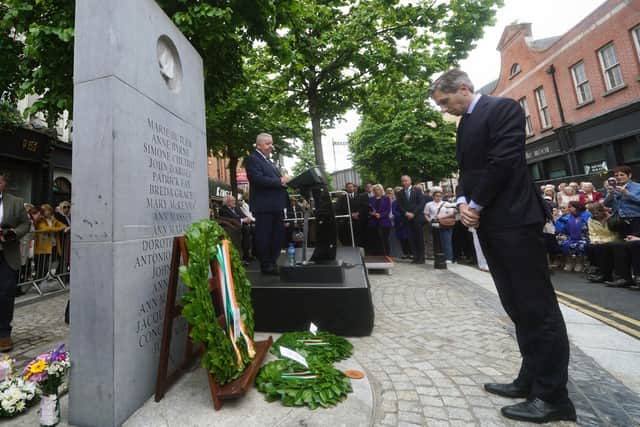 Taoiseach Simon Harris lays a wreath at the Memorial to the victims of the Dublin and Monaghan bombings on Talbot Street in Dublin