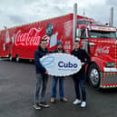 Pictured with Cubo's Robert Steele, national account manager and Niall Delargy, marketing executive is Jack Kennedy from Kennedy International Transport.  Cubo has provided its telematics and communication services to the iconic Coca-Cola Christmas trucks for the famous 2023 tour across the UK and Ireland which visited Belfast last week