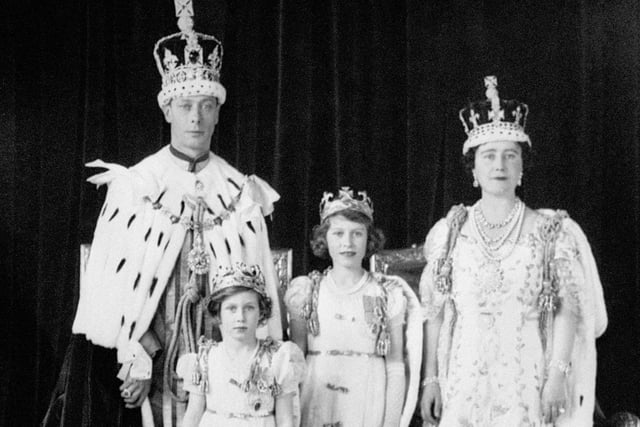 King George VI and Queen Elizabeth with their daughters Princess Elizabeth and Princess Margaret after the coronation in 1937.