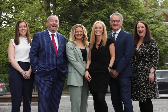 Belfast-based Finlay Wealth Management marks its busiest year as clients seeking advice during economic uncertainty increase. Susan Wilson, operations partner, Jonathan Finlay and the Finlay Wealth Management team