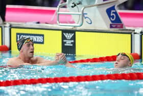 Northern Ireland's Daniel Wiffen (left) offers congratulations to Commonwealth Games winner Sam Short of Team Australia following the men's 800m freestyle final. (Photo by Adam Pretty/Getty Images)