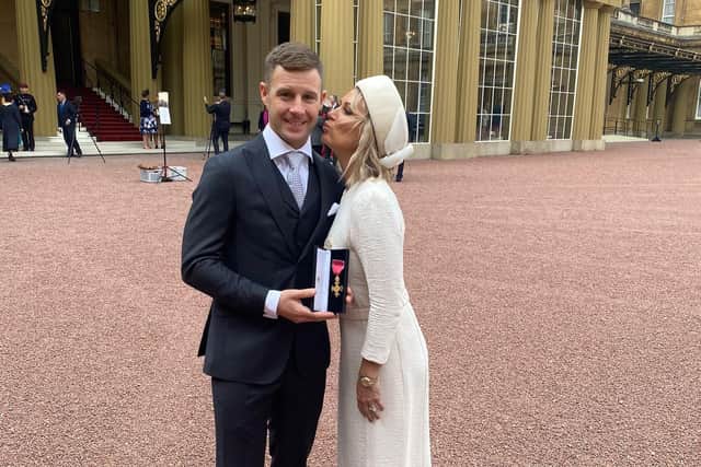 Jonathan Rea with his wife Tatia at Buckingham Palace where he received his OBE from the Princess Royal