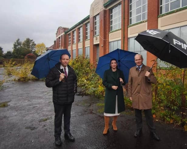 From left, DUP Councillor Paul Rankin, Emma Little Pengelly MLA and Education Authority represenative Roger Sayers at the old Dromore Primary School.