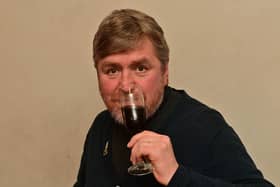 Wine correspondent Raymond Gleug celebrates a marathon win with fine wine and beer
