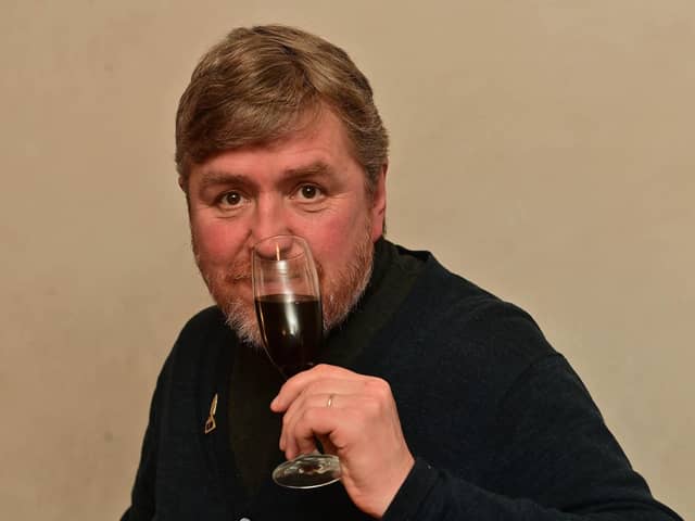 Wine correspondent Raymond Gleug celebrates a marathon win with fine wine and beer