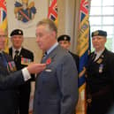 President of the Royal British Legion in Northern Ireland, Col Neil Salisbury (ret’d), pinning a poppy on Lord Lieutenant Lord Nicholas Caledon