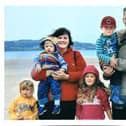 Co Antrim woman Joanne Shiels with her husband and four children