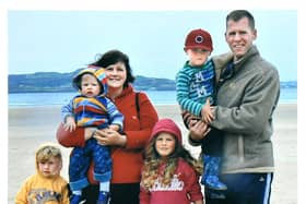 Co Antrim woman Joanne Shiels with her husband and four children