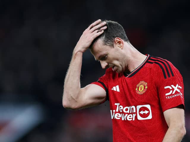 Manchester United's Jonny Evans dejected during the derby defeat to Manchester City on Sunday at Old Trafford. (Photo by Catherine Ivill/Getty Images)