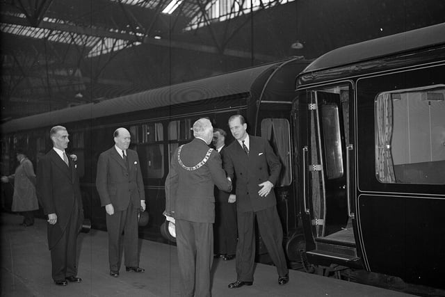 Duke of Edinburgh is welcomed by Lord Provost Johnson-Gilbert at Princes Street Station in March 1960.