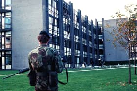 A soldier guards the scene of the bombing at Jordanstown university campus
