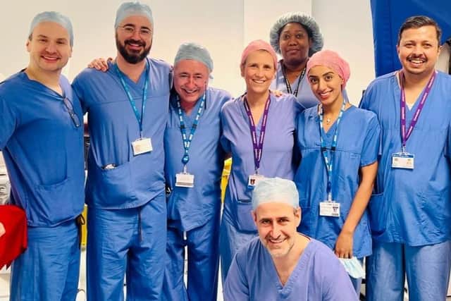 The surgical team behind the UK's first womb transplant. Surgeons have performed the UK's first womb transplant on a woman whose sister was the living donor. The 34-year-old married woman received the womb - also called the uterus - during an operation lasting nine hours and 20 minutes carried out at the Churchill Hospital in Oxford.
Photo: Womb Transplant UK/PA Wire