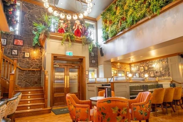 The stunning lobby entrance to the Ashburn Hotel's restaurant and bar which has been tastefully refurbished with an amazing living wall as a stairwell centre piece.