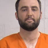 Screen grab taken from the Louisville Metropolitan Department of Corrections of Scottie Scheffler's mugshot after he was detained by police for reportedly attempting to get around a traffic jam caused by a fatal accident near Valhalla