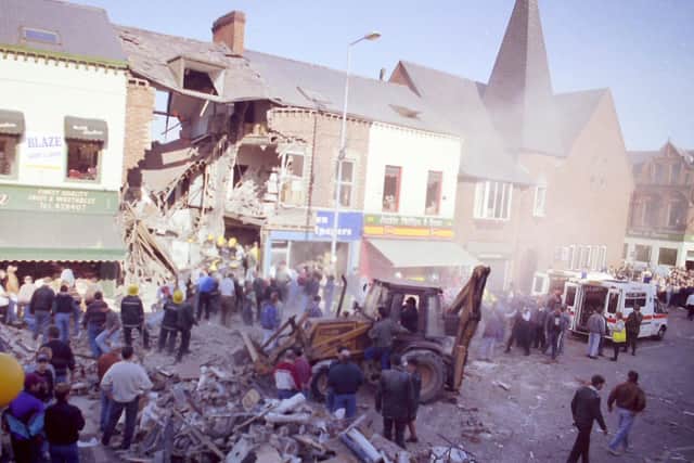 The aftermath of the IRA's Shankill Road bomb in 1993, which killed nine local people and one of the bombers.