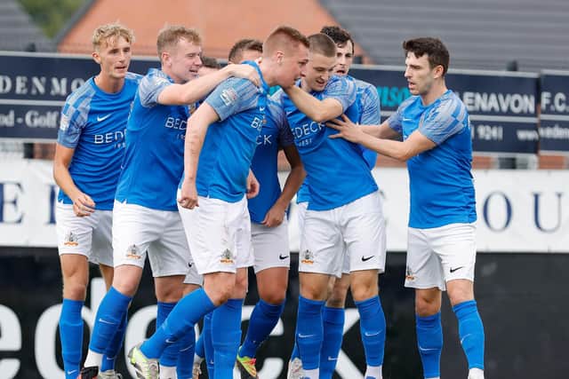 Glenavon players celebrate Calum Birney's early header against Ballymena United at Mourneview Park